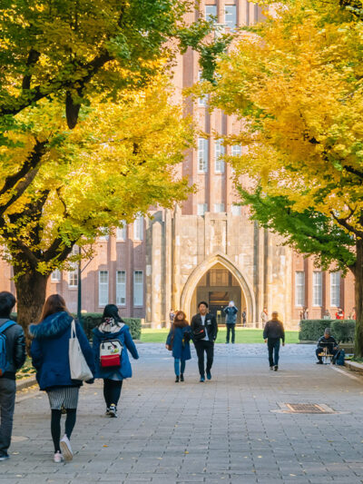 Students walking on a college campus.