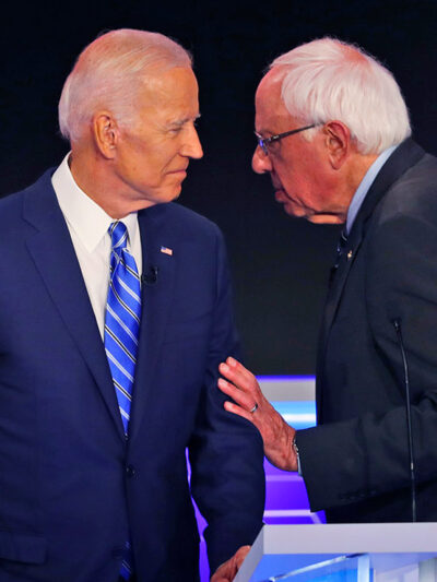 Joe Biden and Bernie Sanders are shown at the Democratic Debate