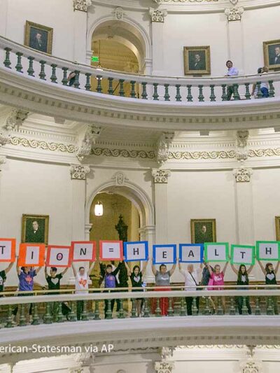 Representatives of the Trust, Respect, Access Coalition, holding multicolored signs spelling out ABORTION=HEALTHCARE, gathered in the Texas Capitol Rotunda Thursday afternoon July 27, 2017 to voice their opposition to abortion legislation being...
