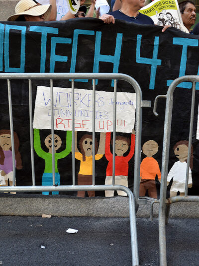 Demonstrators hold banner that reads "#NoTech4Ice"outside Jeff Bezos, CEO of Amazon, Manhattan apartment to protest Amazon technology being used by the Department of Homeland Security.