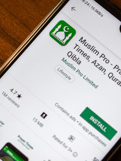 Muslim Pro app on the display of a smartphone.