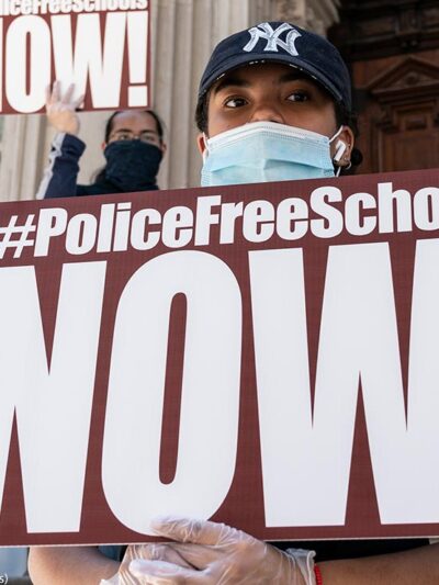 Protesters demanding removing police officers from schools on steps of Department of Education know as Tweed Courthouse in New York on June 25, 2020.