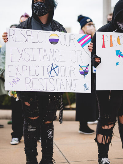 Demonstrators protesting anti-trans bills.