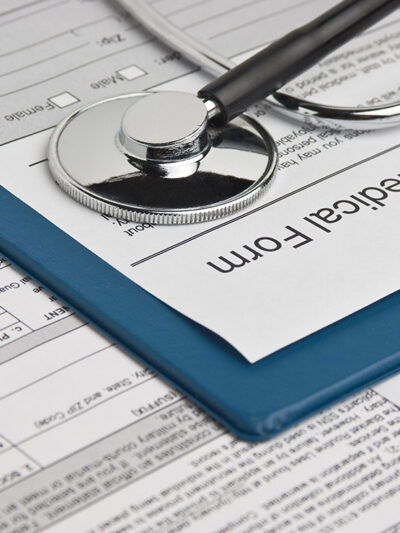 Clipboard with medical form and stethoscope attached