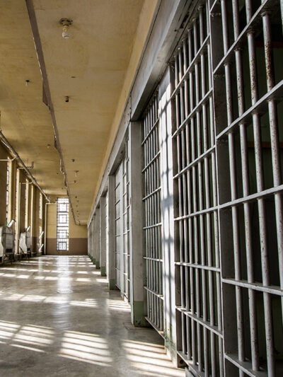 Prison cells and empty hallway