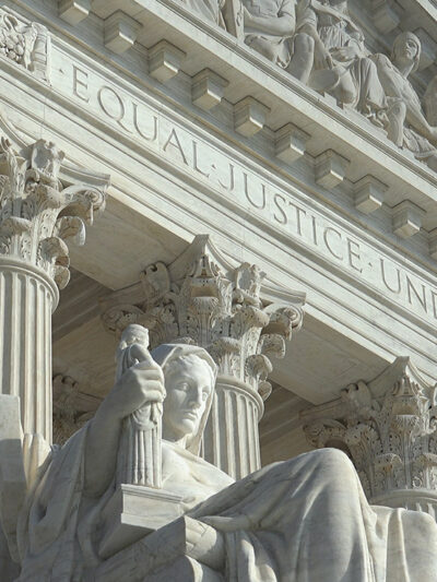 "Equal Justice Under Law" engraving above entrance to US Supreme Court Building.