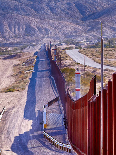 El Paso, Texas border wall between USA and Mexico running thru the desert.