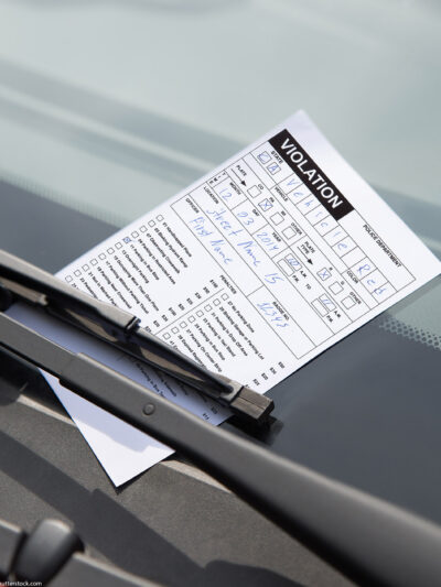 Traffic violation on a windshield.