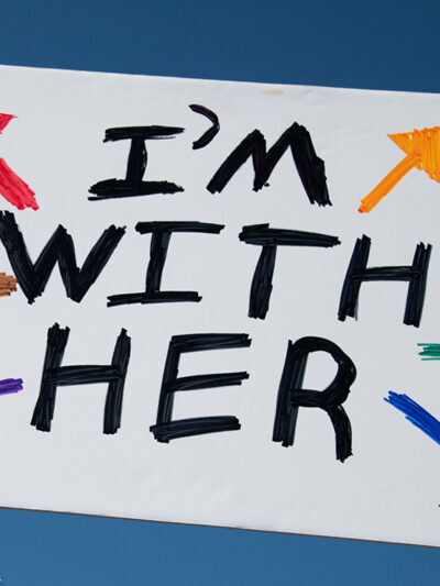 A protest sign that reads, "I'm With Her"