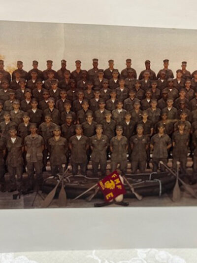 Shawn Jensen (third row from bottom, ninth from left) pictured with the First Recon team in early 1968.