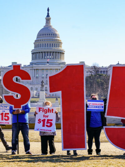 Activists appeal for a $15 minimum wage near the Capitol in Washington.