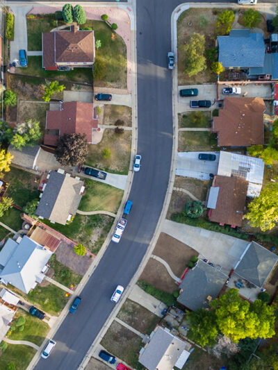 An aerial view of a neighborhood filled with houses.