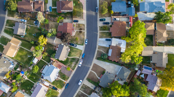 An aerial view of a neighborhood filled with houses.