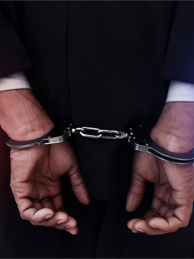 Businessman in handcuffs