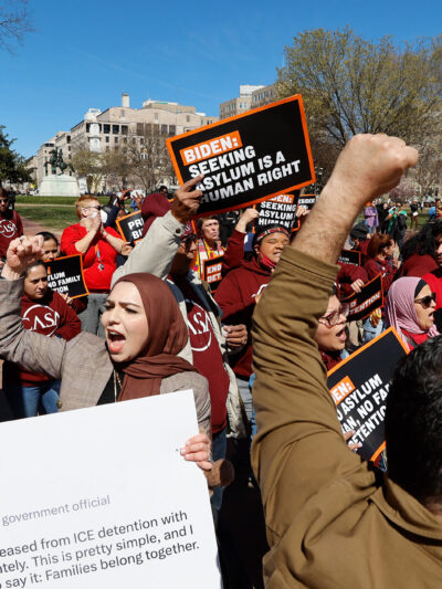 Activists march to the White House to demand no asylum ban and no family detention.