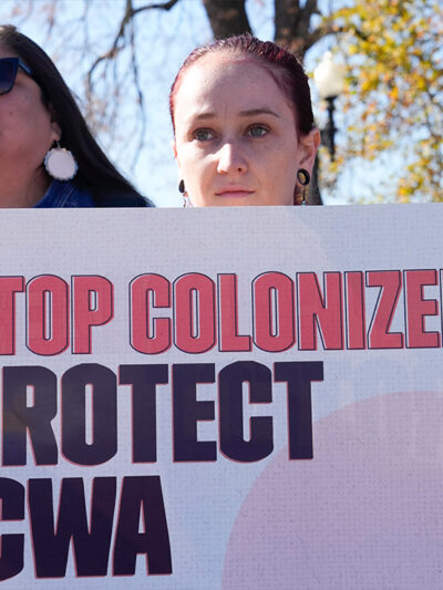 Demonstrators stand outside the US Supreme Court to hear decisions over Indian Child Welfare Act.