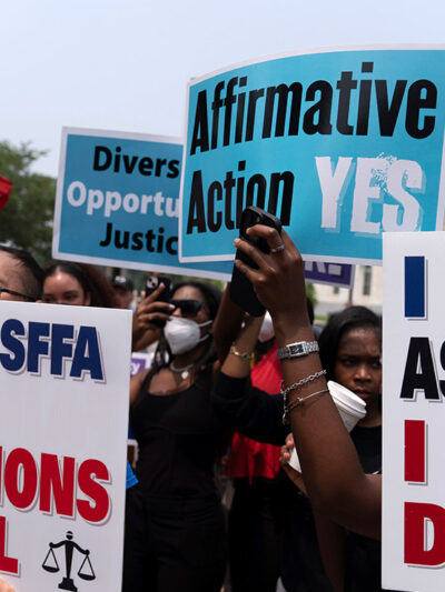 Demonstrators protest outside of the Supreme Court in Washington.