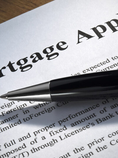 Close up of a mortgage application and a pen.