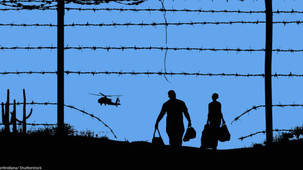 A man and woman with baggage at the border.