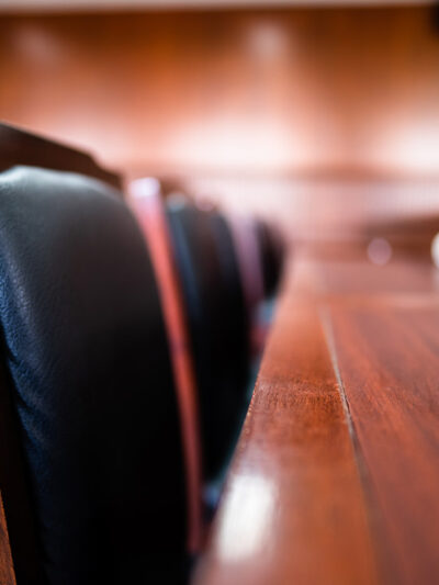 A close up image of a series of jury seats.