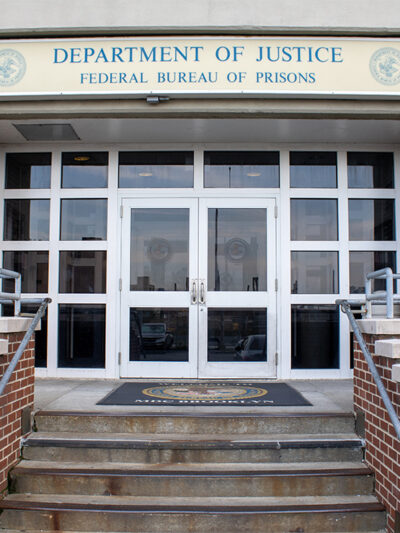 Entrance to the Department of Justice Federal Bureau of Prisons in Brooklyn, NY.