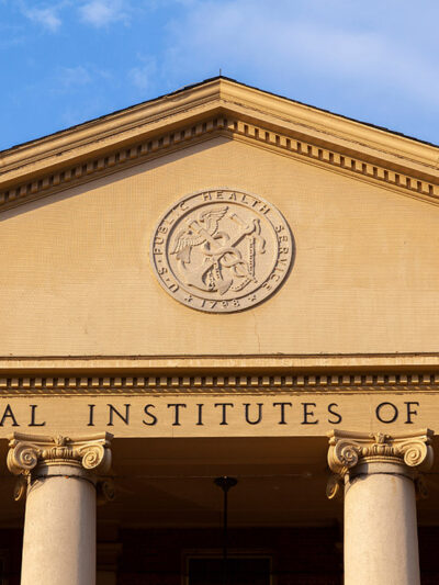 Exterior view of the main historic building of National Institutes of Health (NIH) inside Bethesda campus.