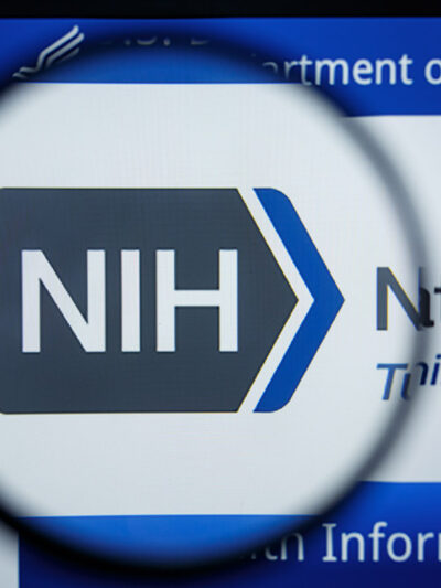 The The National Institutes of Health homepage with a closeup of its logo.
