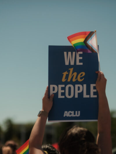 We the People with a rainbow flag
