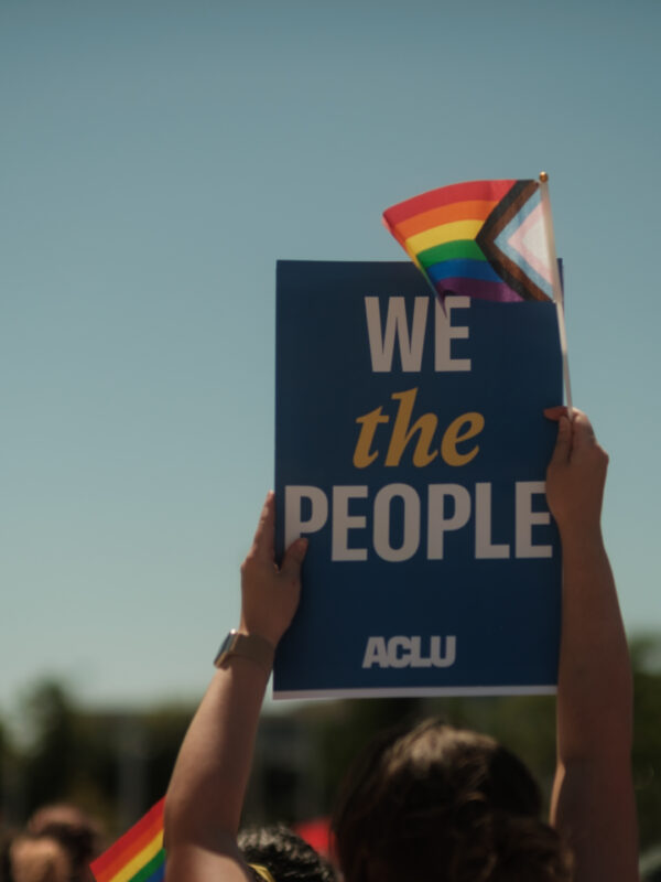 We the People with a rainbow flag