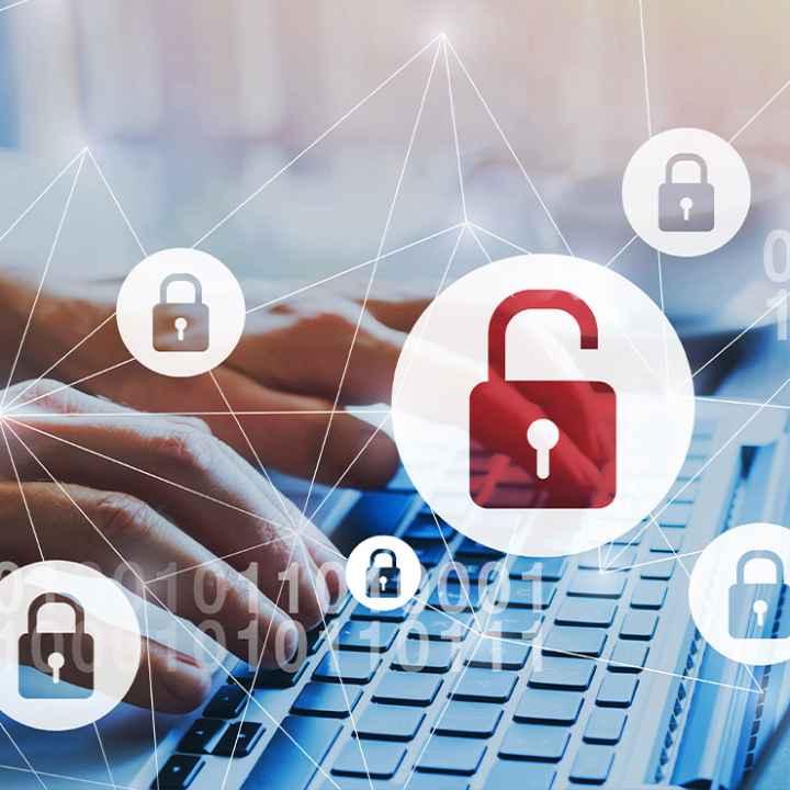 Person typing on a laptop, depicting data breach with animation of open lock over image.