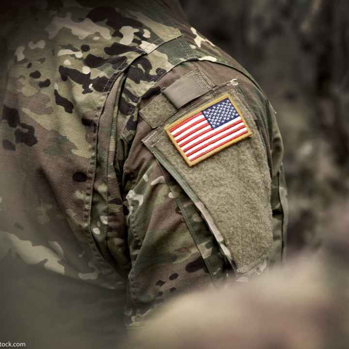 USA flag on soldier's arm.