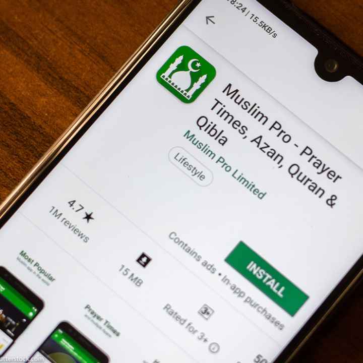 Muslim Pro app on the display of a smartphone.